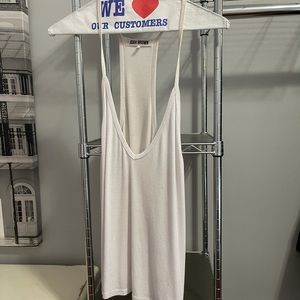 Baggy white tank. Deep V. Good basic!